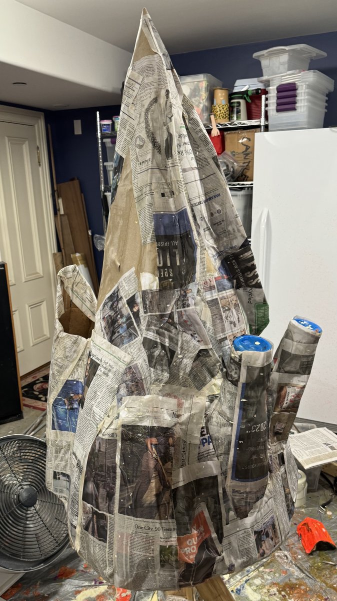 Head w NewsPaper.jpg